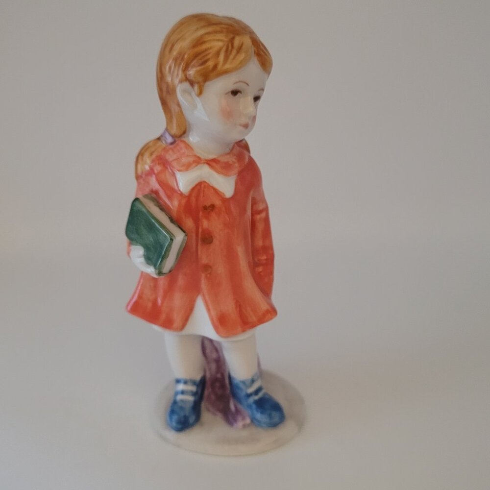 Vintage Hand Painted Porcelain Girl Figurine Holding Books